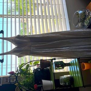 Sparkle prom dress! The size is 7/8 in women’s, it is a cream color :).